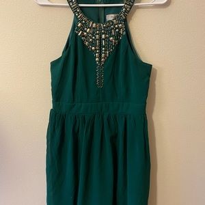 Brand: Maniju. Size: M. Color: Green and silver.